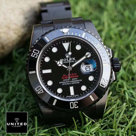 Rolex Blaken Submariner Black Dial Replica on the grass