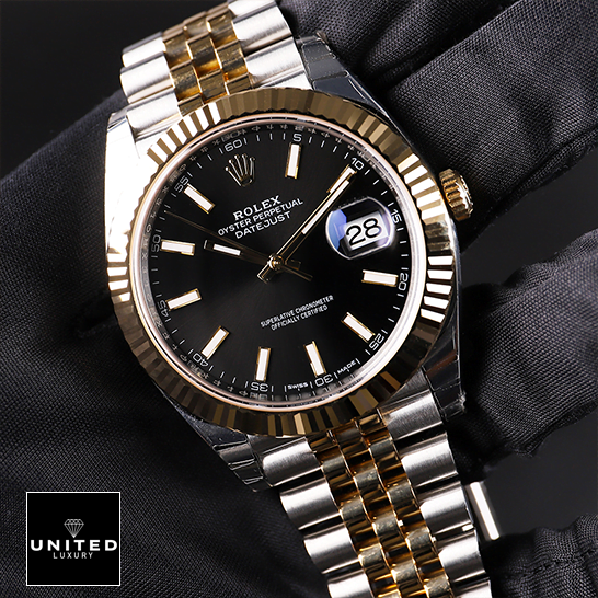 Rolex Datejust 126333 Yellow Gold Steel Black Dial Jubilee Replica on the hand